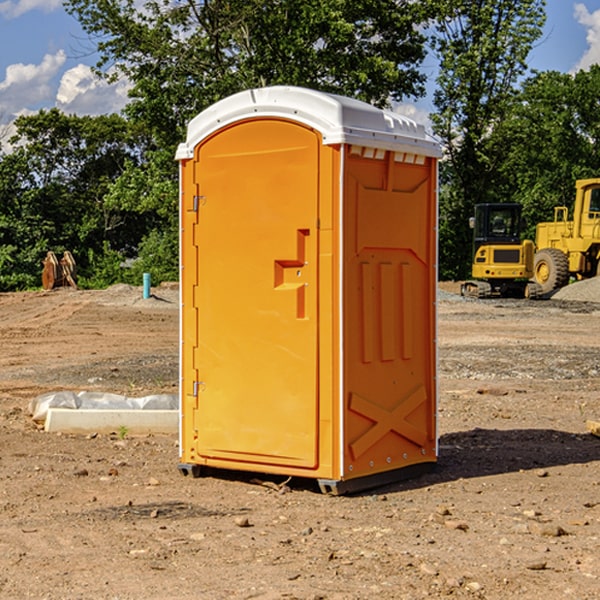 how often are the porta potties cleaned and serviced during a rental period in New Munich